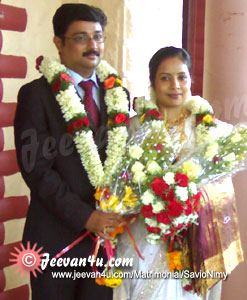 Savio Nimy Wedding Photo Album at St Thomas church Thampalakad Kanjirappally